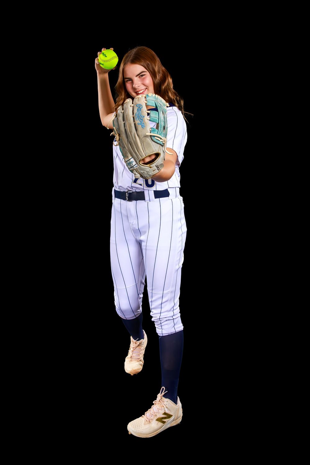 Baseball player in pinstripe uniform holds tennis ball while posing in four different action stances against black background.
