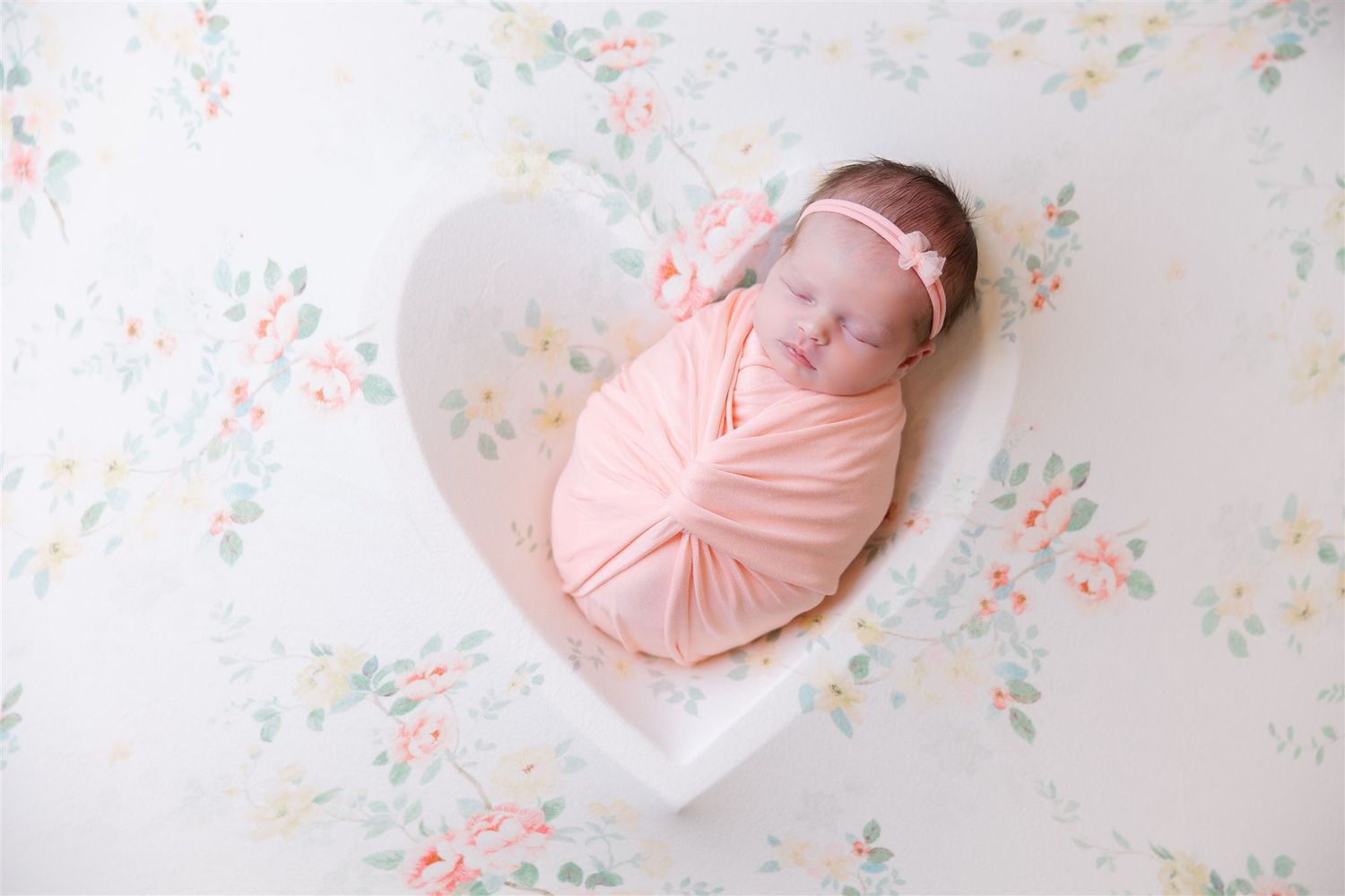 baby in floral