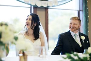 A series of wedding photos showing joyful moments and celebrations at an indoor venue.