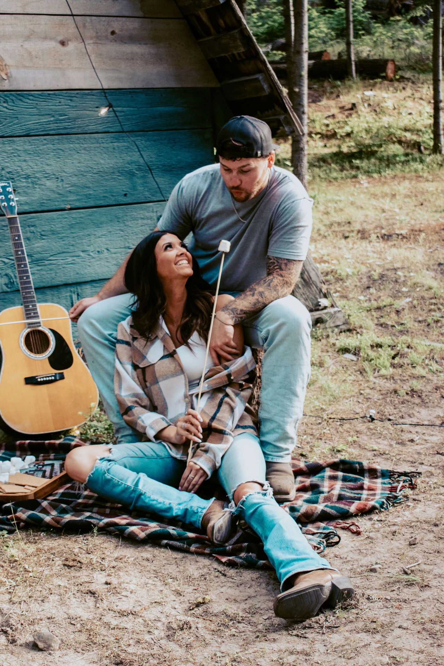 Cozy forest couples session with boho vibes and acoustic guitar—ideal for storytelling portraits in the PNW woods around Mount Rainier