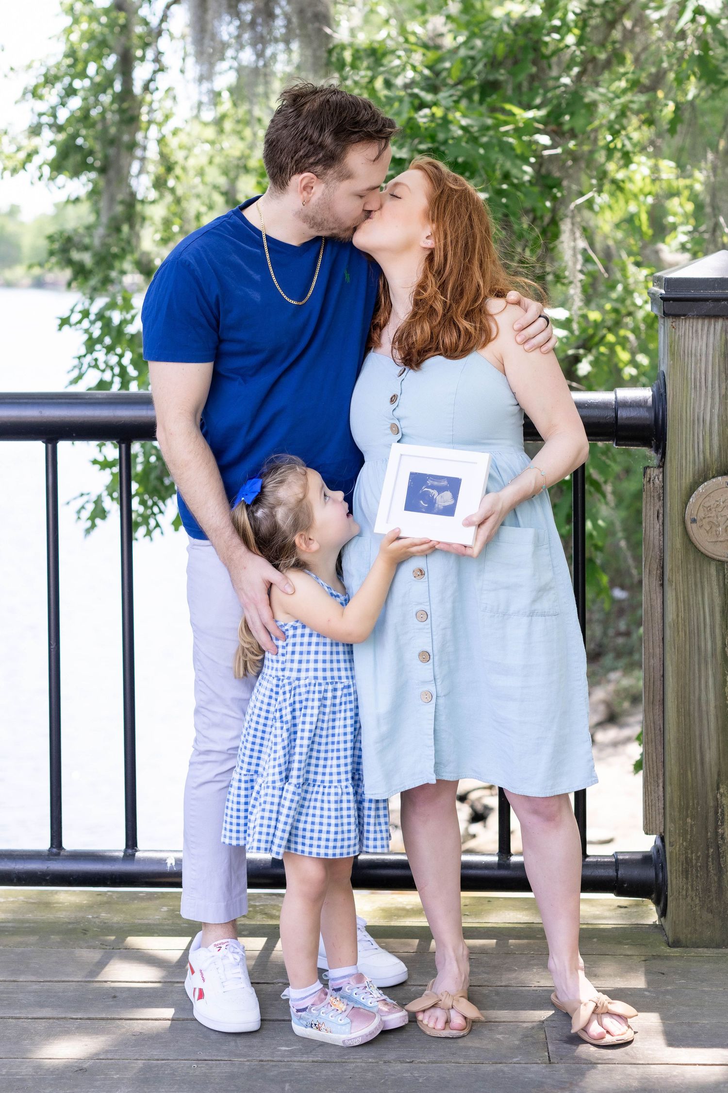 Outdoor maternity session under trees with boyfriend and daugther, Essex County photographer.