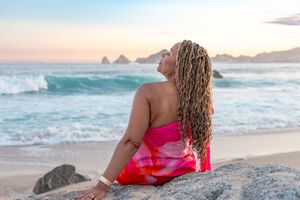 A scenic series of beach photos showing waves crashing on shore at sunset with rocky formations in the distance.