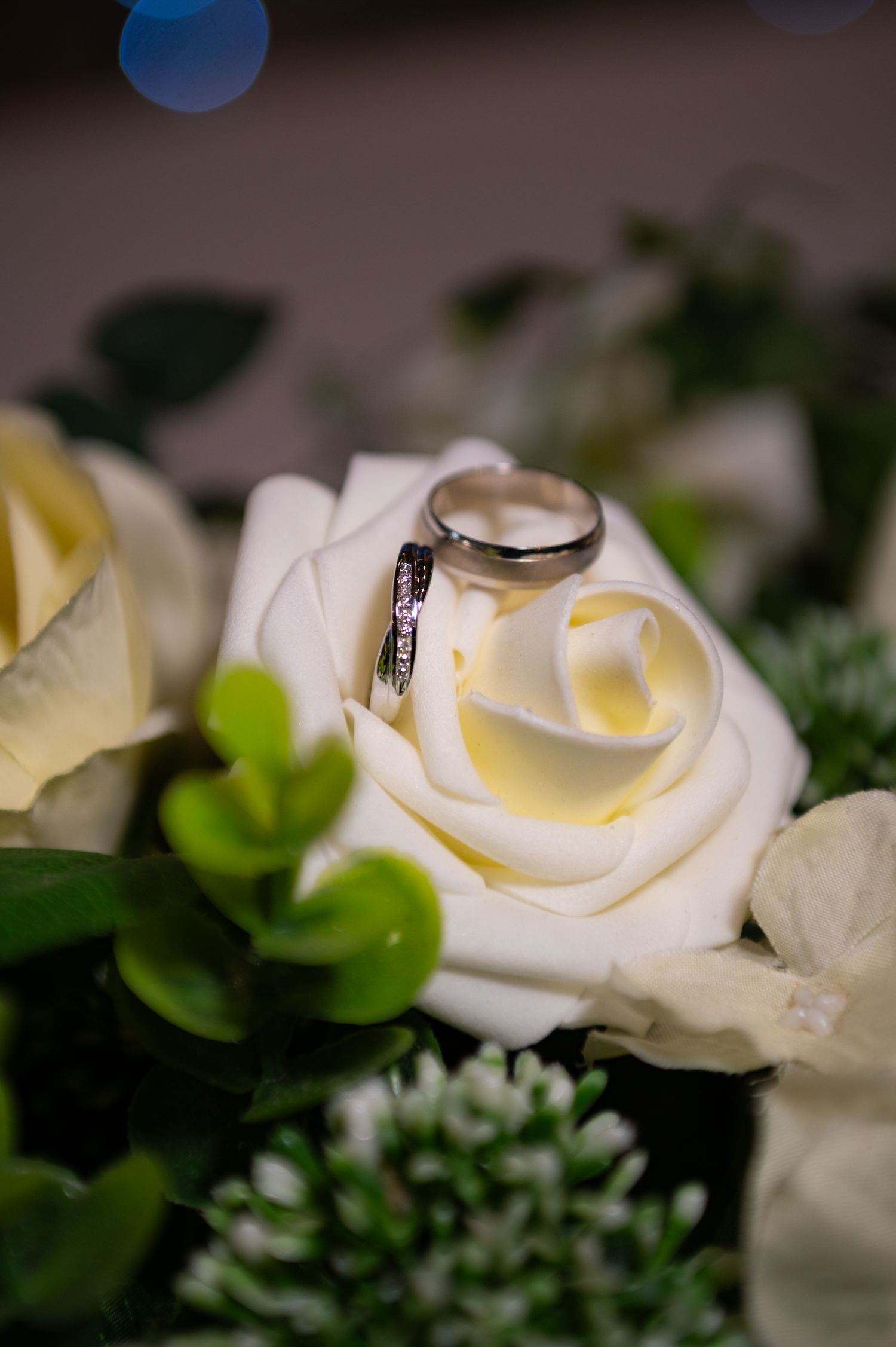 rings in brides flowers