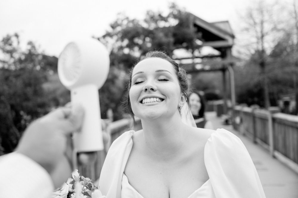 Joyful candid moments captured during an outdoor wedding celebration.