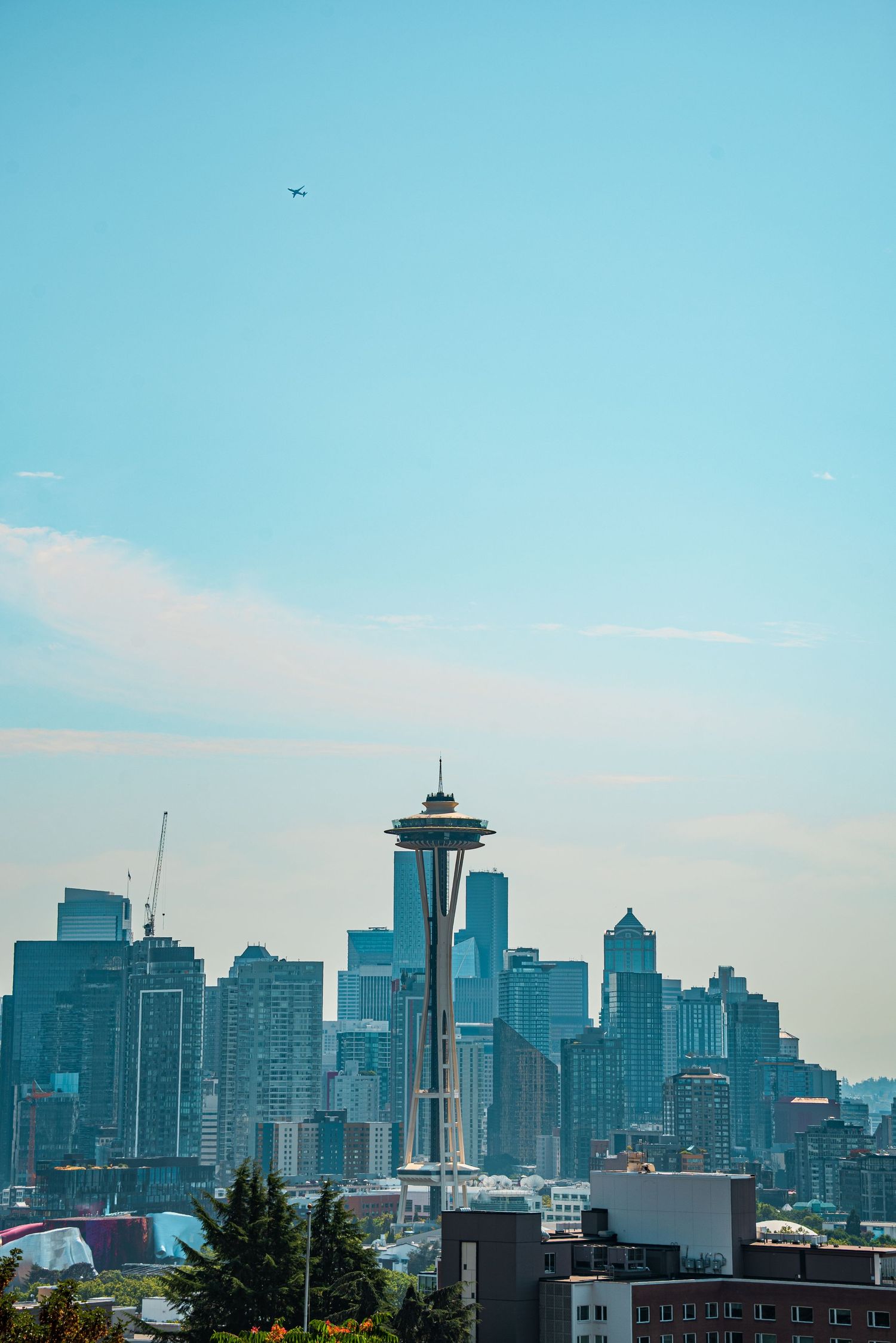 Seattle skyline with modern skyscrapers against clear blue sky.