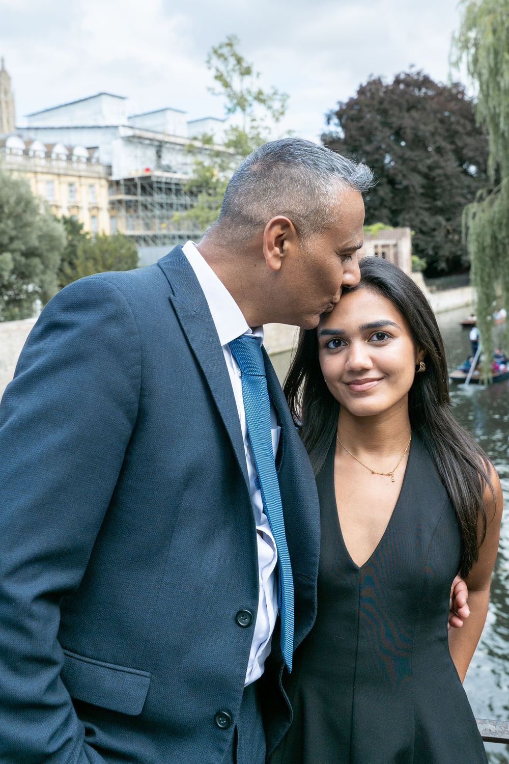A couple in formal attire shares intimate moments in a series of outdoor photos.
