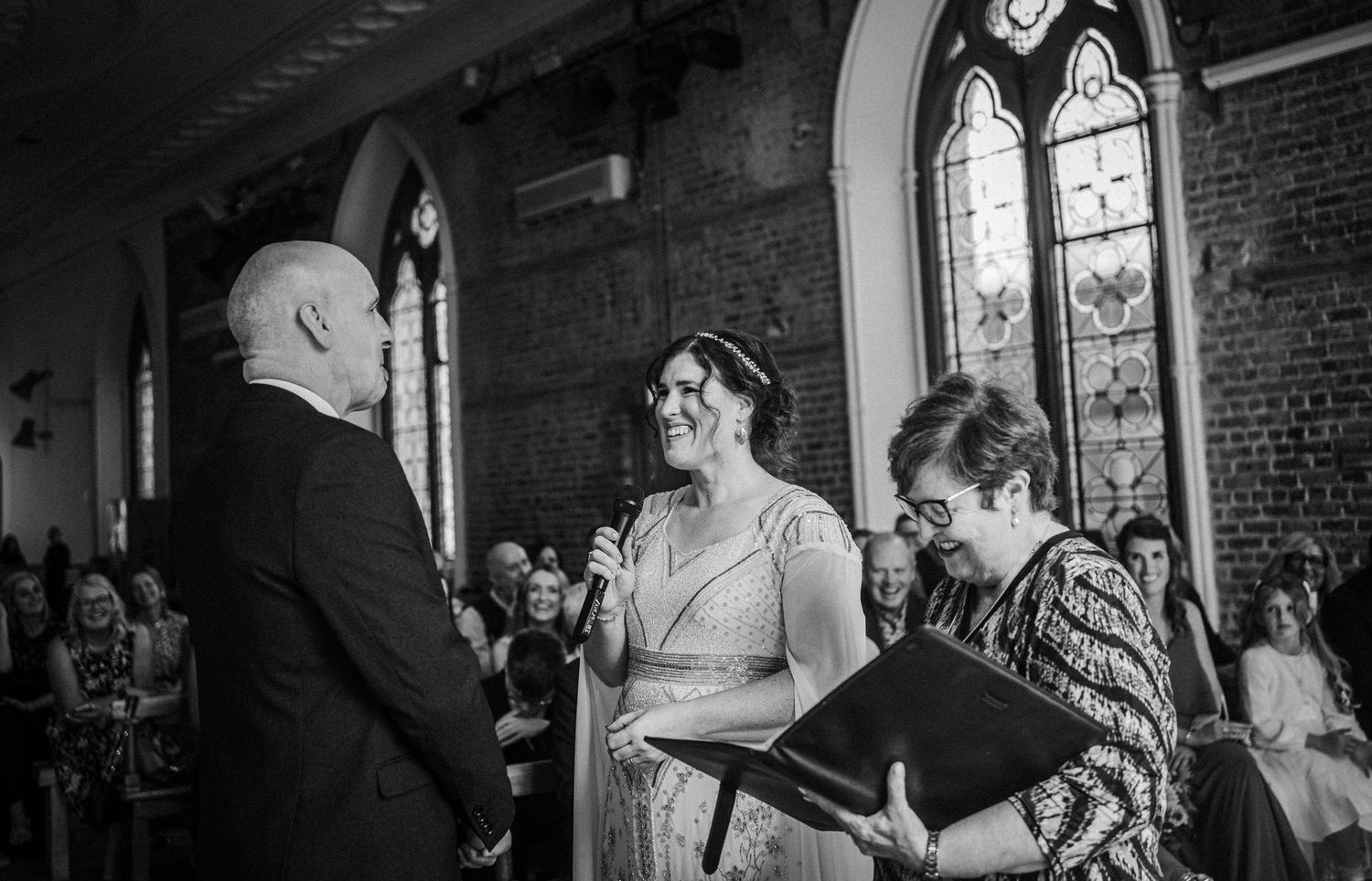 Black and white photo montage shows various couples dancing and socializing at a lively party.