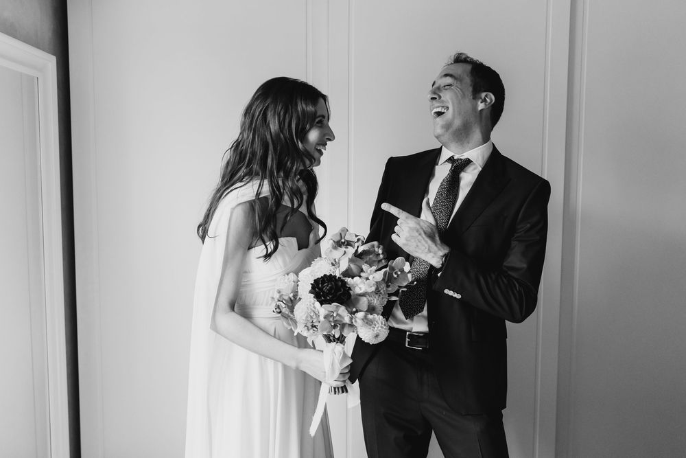 Black and white wedding moments showing joyful interactions.
