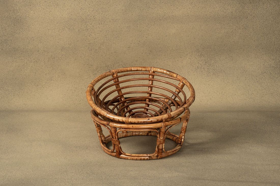 Rattan furniture piece shown in six progressive stages of assembly from flat pieces to completed curved bench form.