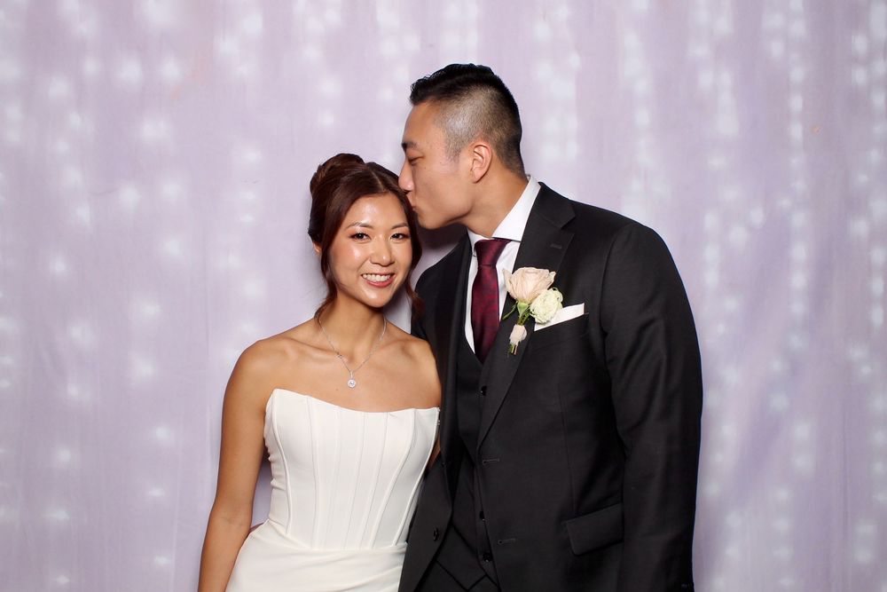Four romantic wedding portraits against a purple bokeh background show loving couple in traditional bridal attire.