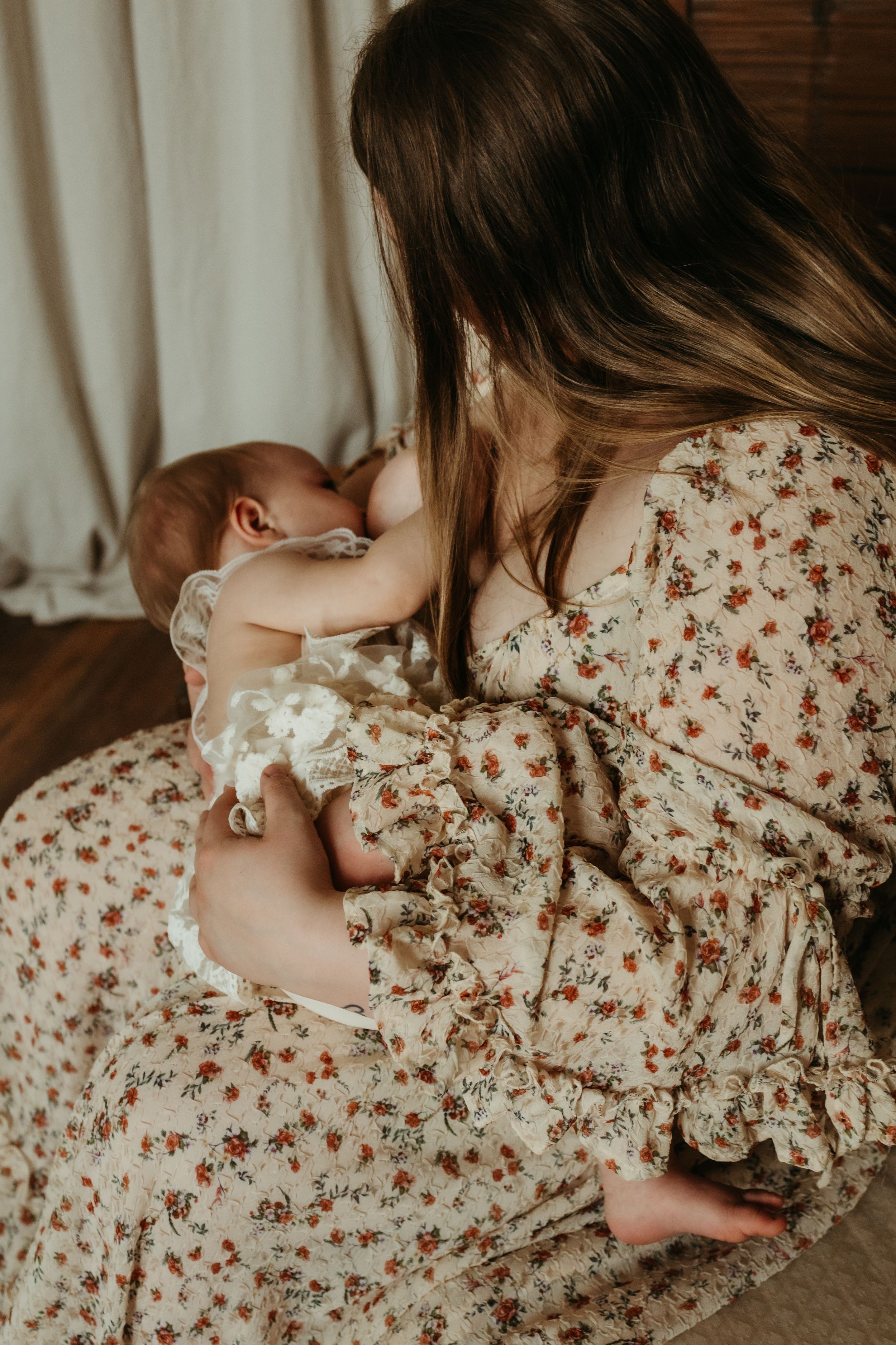 A series of intimate close-up shots showing tender moments in a floral dress against a light background.