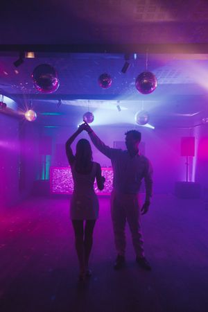 Bride and groom dancing and celebrating at Johannesdal 1207 wedding reception