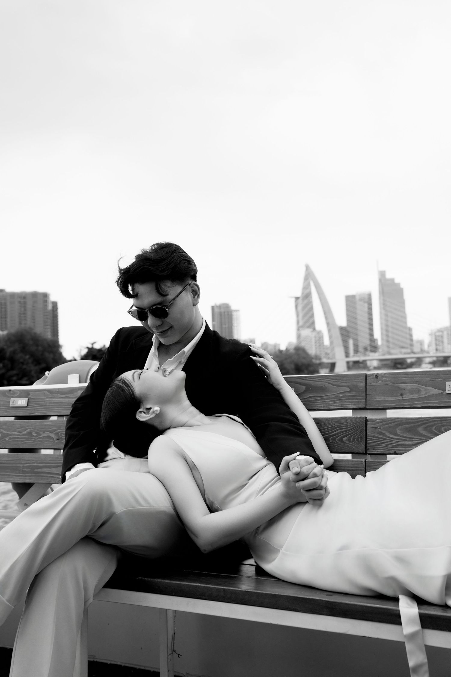 alt="Couple prewedding photoshoot at harbor & yachts"