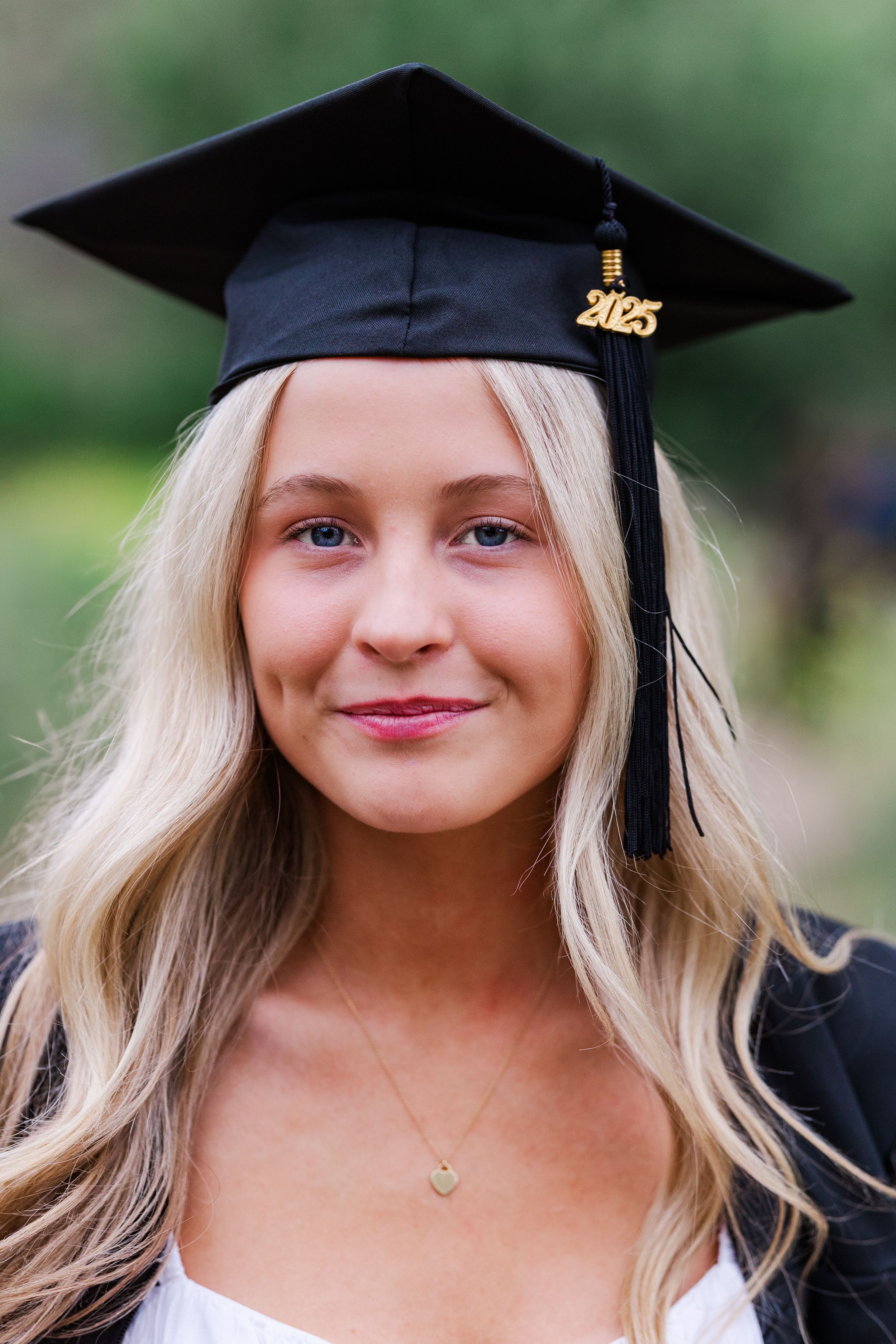 Outdoor senior portrait in Ventura County, captured in natural light by a professional photographer with a light and airy style.