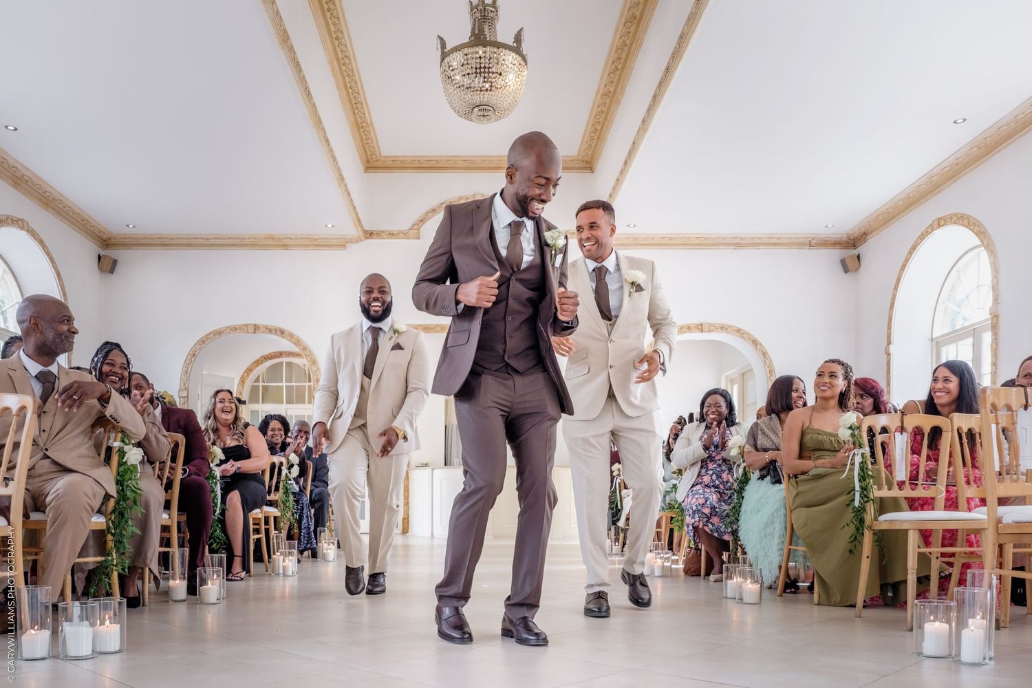 A sequence of dance moves captured at a wedding reception showing joyful guests dancing in an elegant white room.