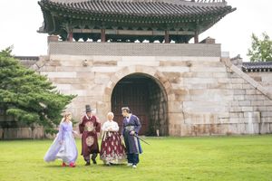 Ancient Korean temple architecture with traditional curved roofline and stone walls.