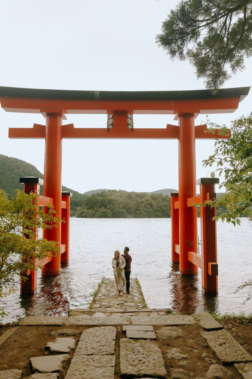 Couple proposal and engagement photography at Lake Ashi Peace Torii Hakone Shrine Japan