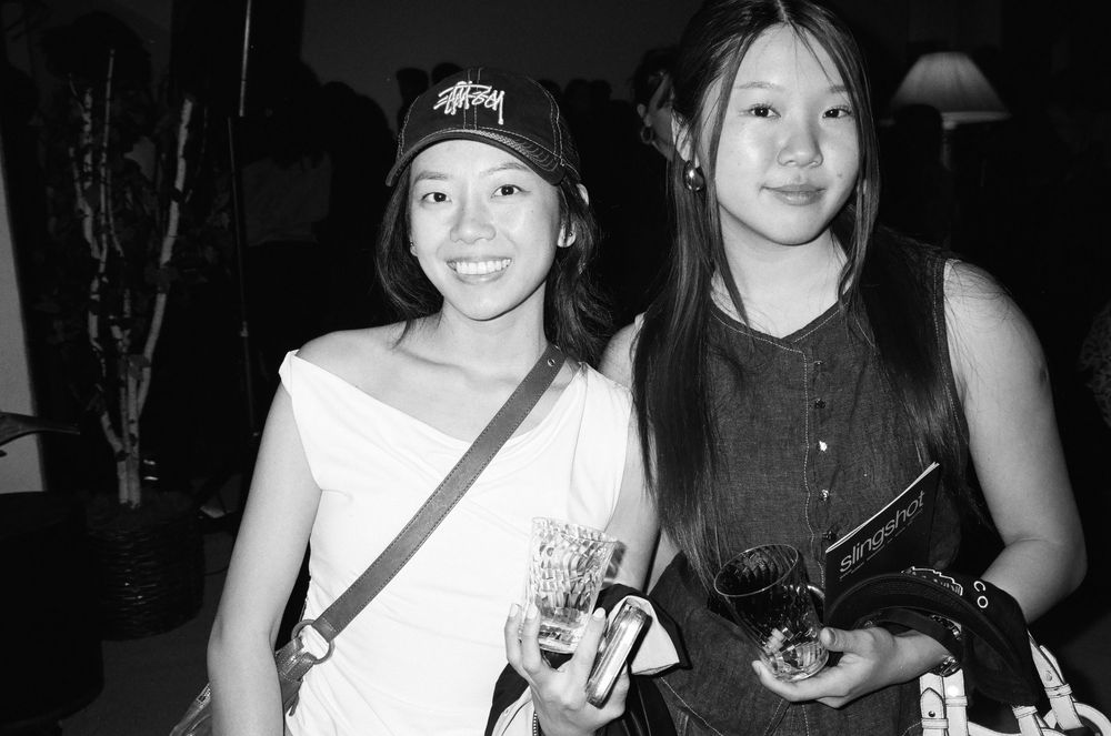 A series of candid black and white photographs showing people socializing at an event.