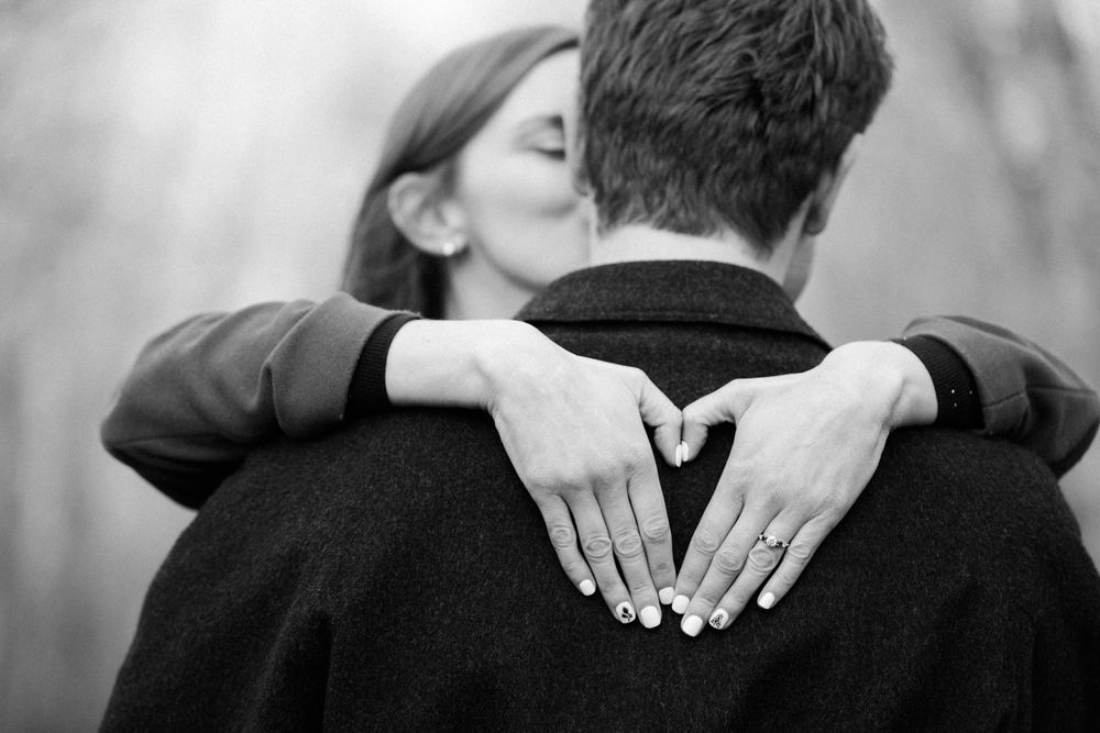 A series of black and white photographs showing close-up details of an intimate embrace between two people.