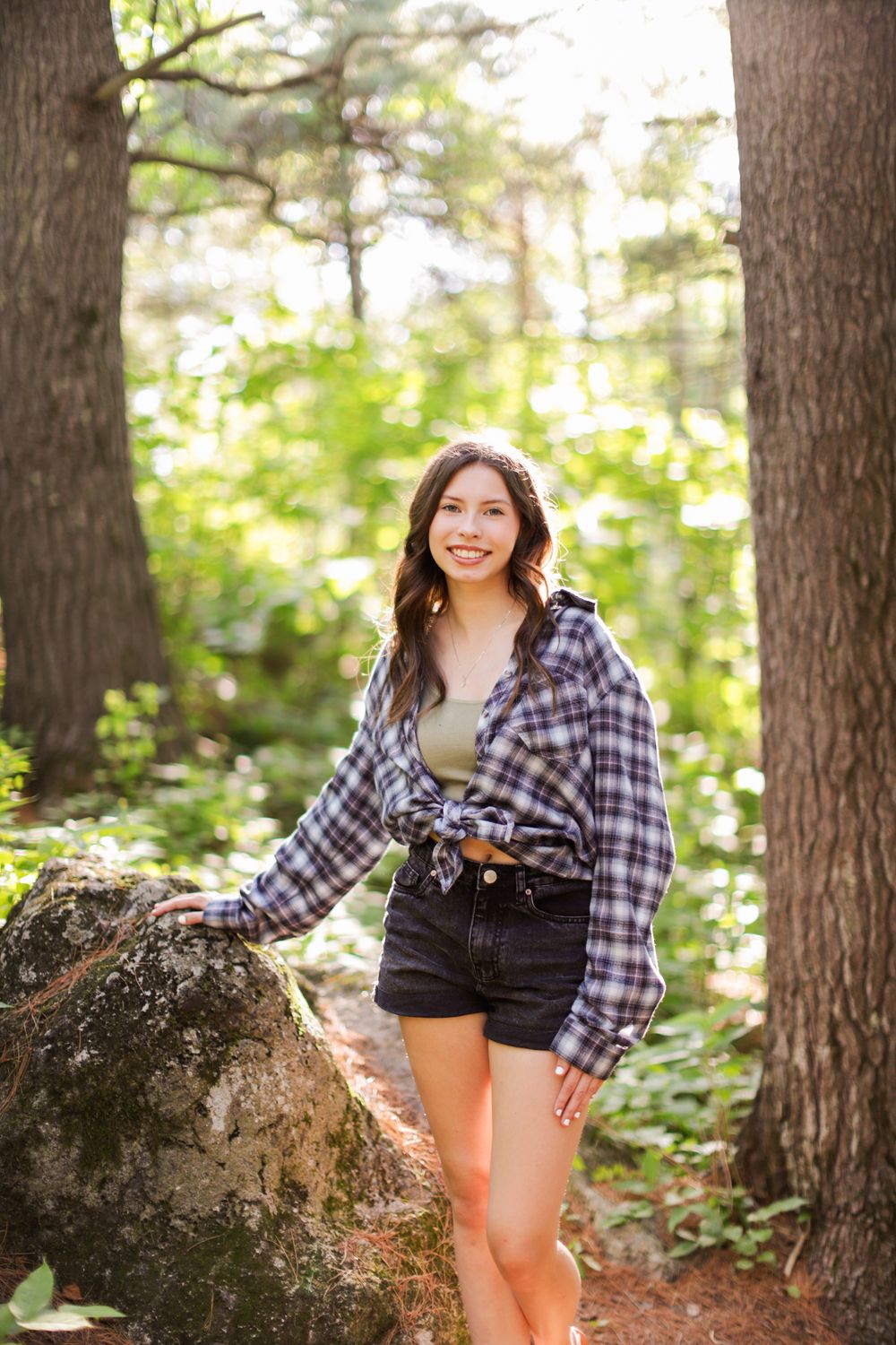 Relaxed senior portrait at Enger Tower Park in Duluth, MN