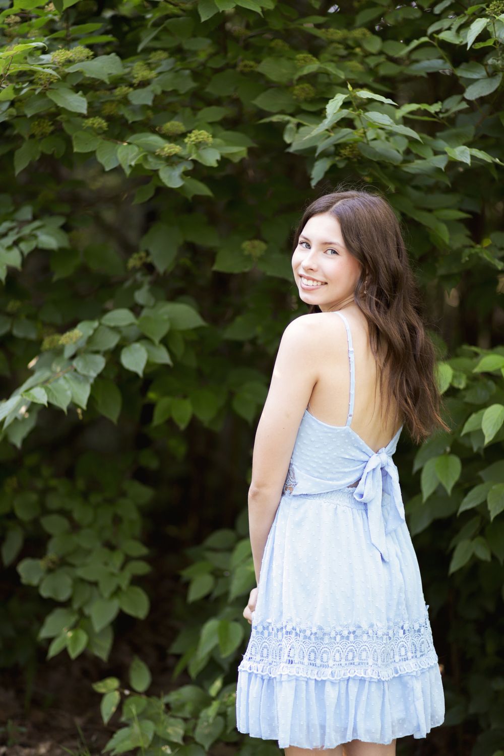Senior girl smiling during a photo session at Enger Tower Park in Duluth, MN