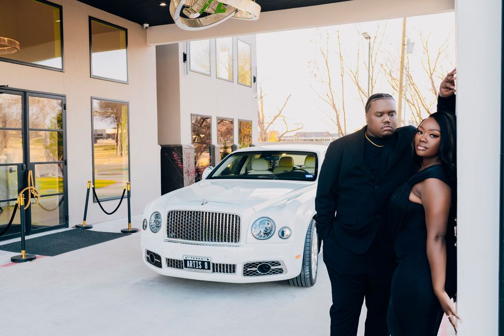 A series of connected photos showing a luxury car dealership interior with white walls and modern design elements.