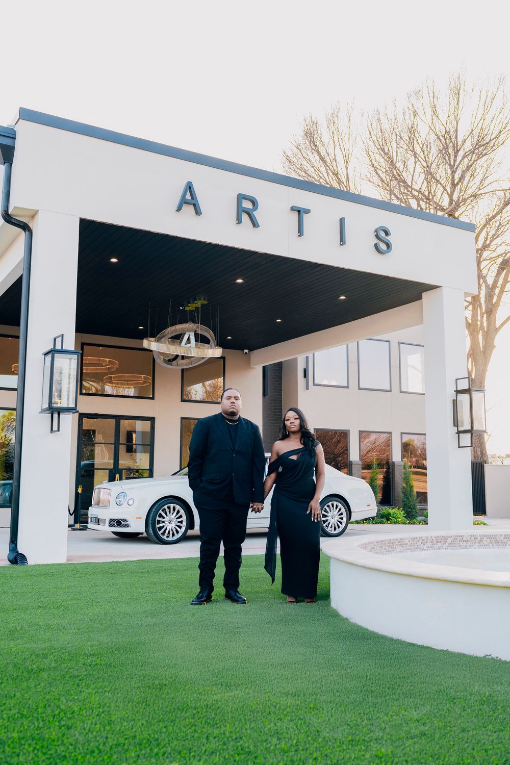 Full body engagement portrait at Artis Event Center venue in DeSoto TX
