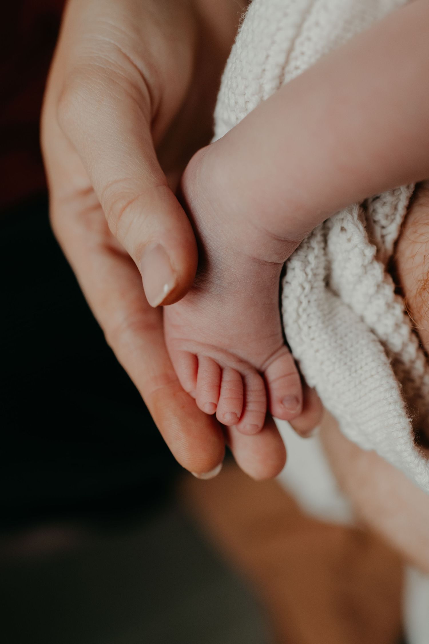 A close up of a new born's foot