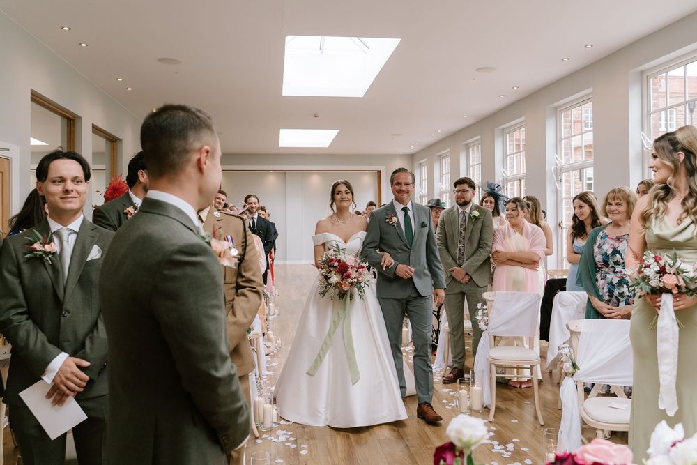 A collage of wedding ceremony moments showing guests and couples in an elegant indoor venue, photographed by Laura Jenkinson Photography