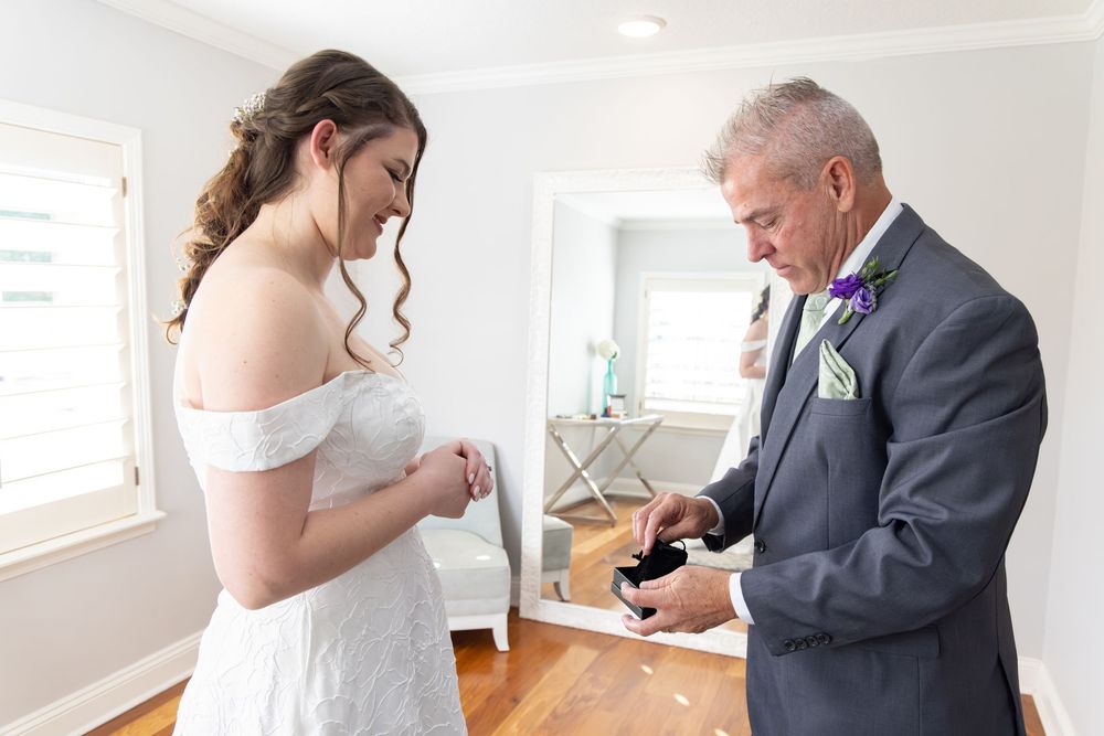A series of emotional moments captured during a wedding as a bride gets ready with family members.