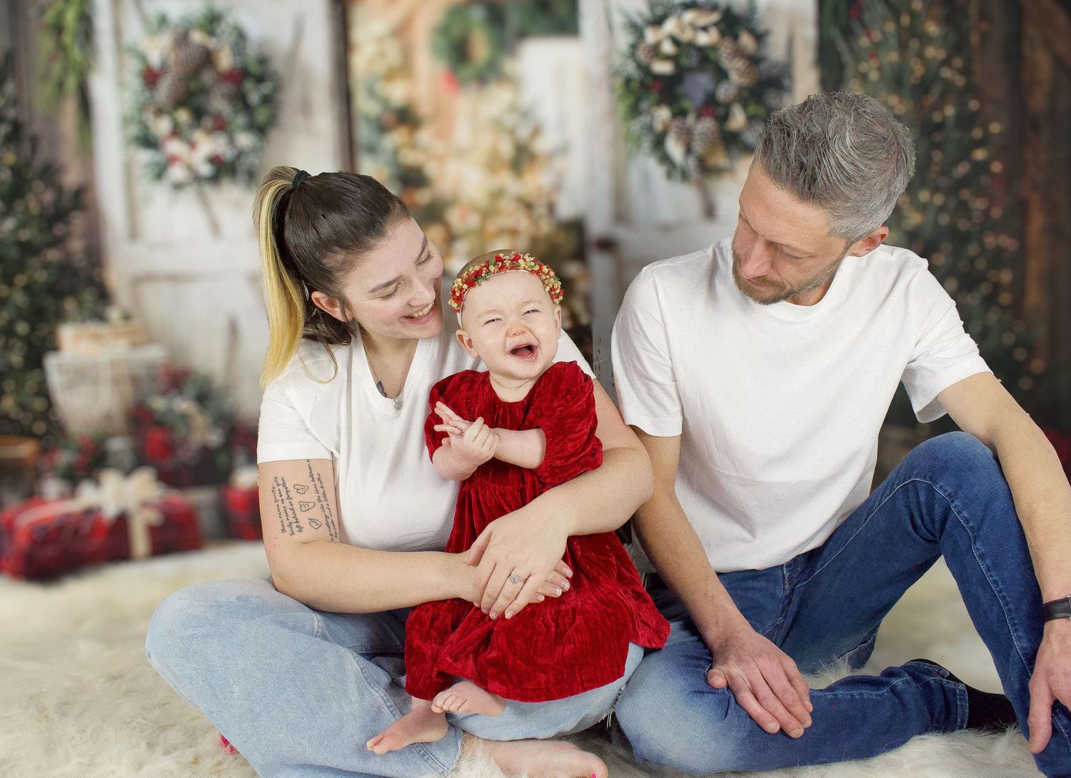 A series of candid family photos showing tender moments between parents and child in casual home settings.