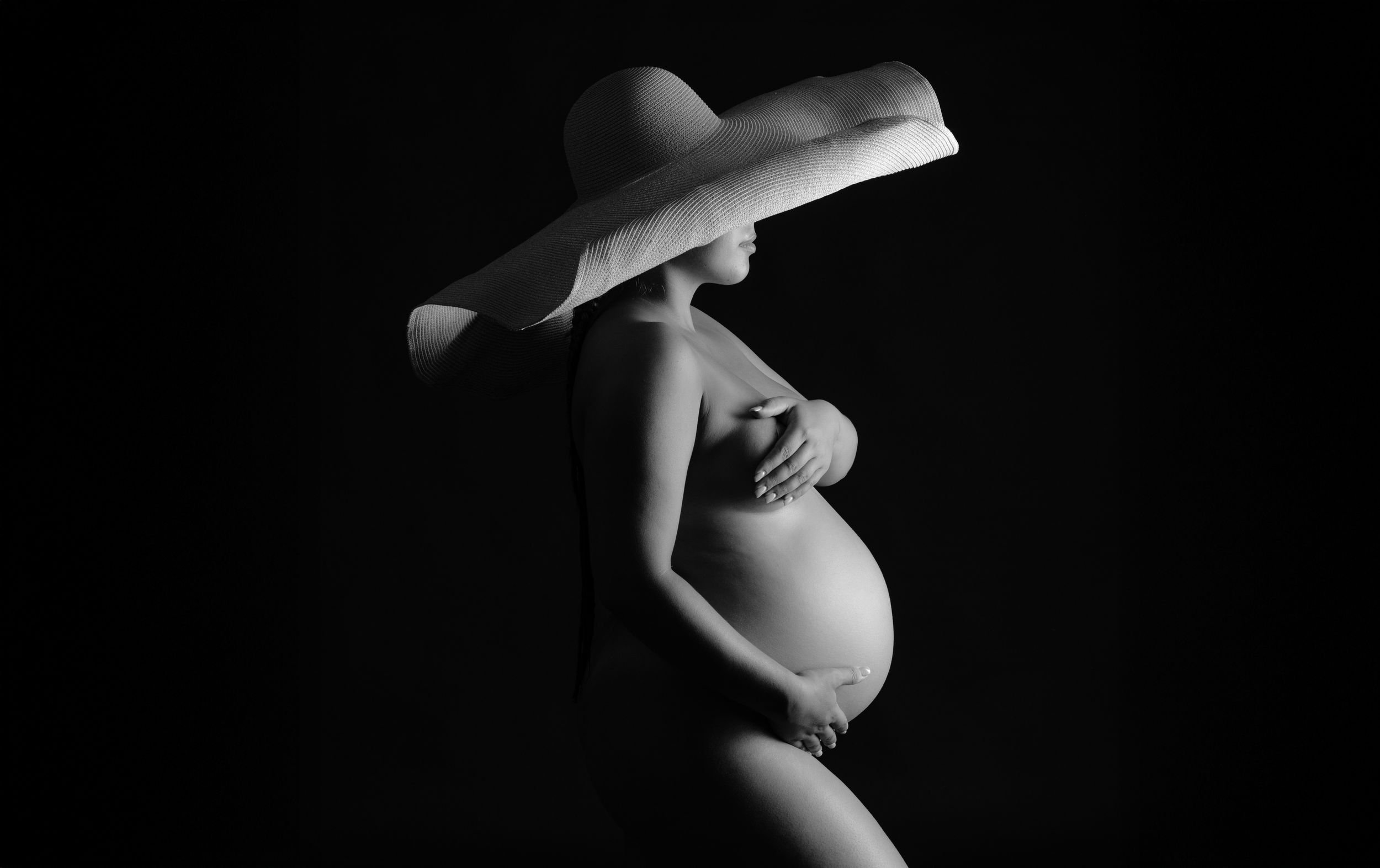 Black and white artistic nude photography series showing abstract curves and shadows of the human form.