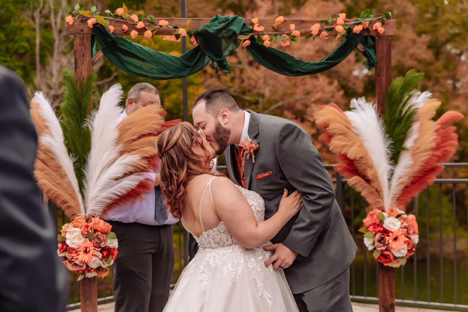 A romantic outdoor wedding moment captured in a series of photos with fall colors and floral bouquets.