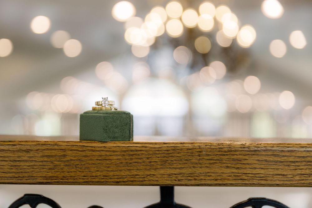 Bokeh lights create a dreamy background effect with soft glowing orbs of warm light in a blurred composition.