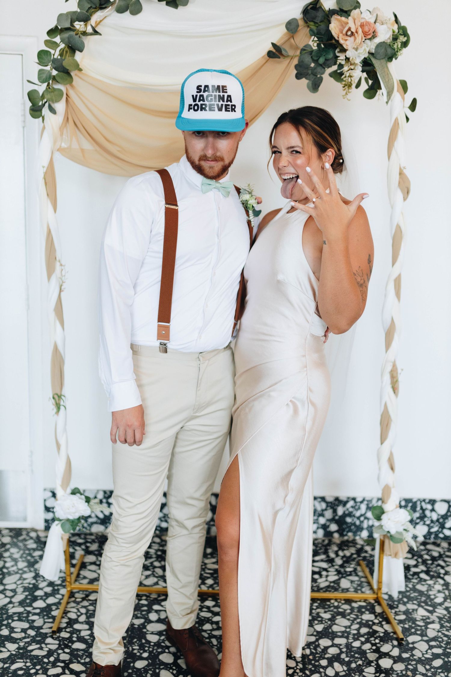 Bride and groom sharing a close moment during their wedding day.