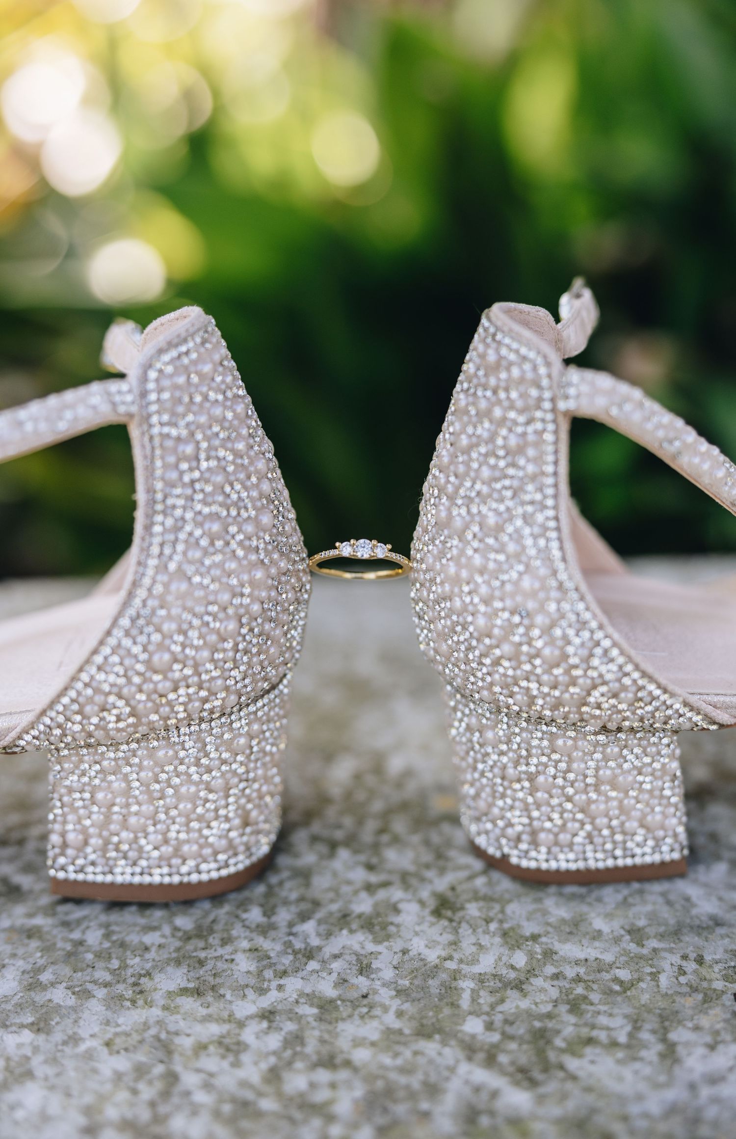 Bride’s wedding heels placed together during a wedding detail photo.