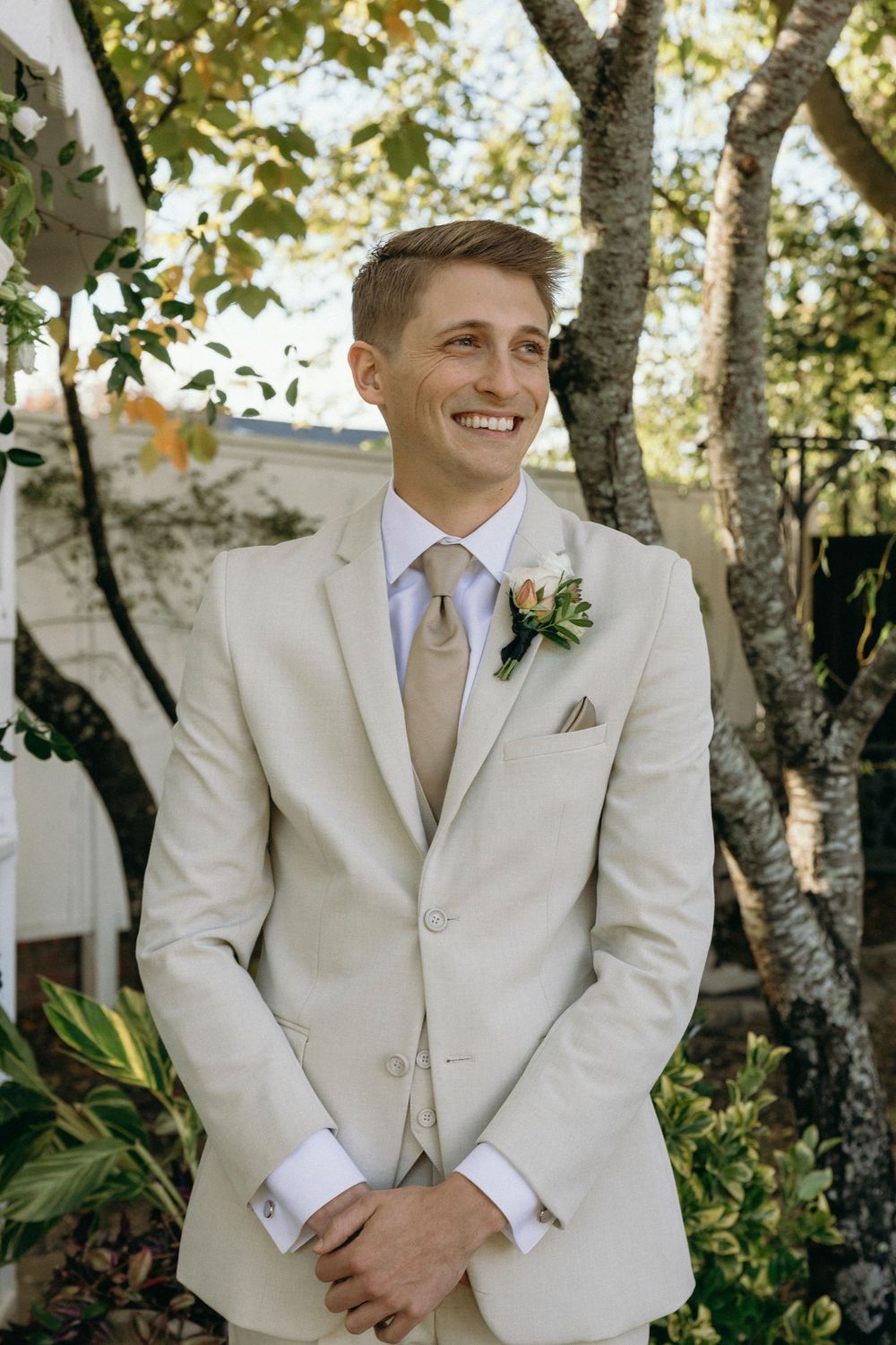 A groom during an outdoor garden wedding ceremony at Lillian Gardens in Newnan, Georgia
