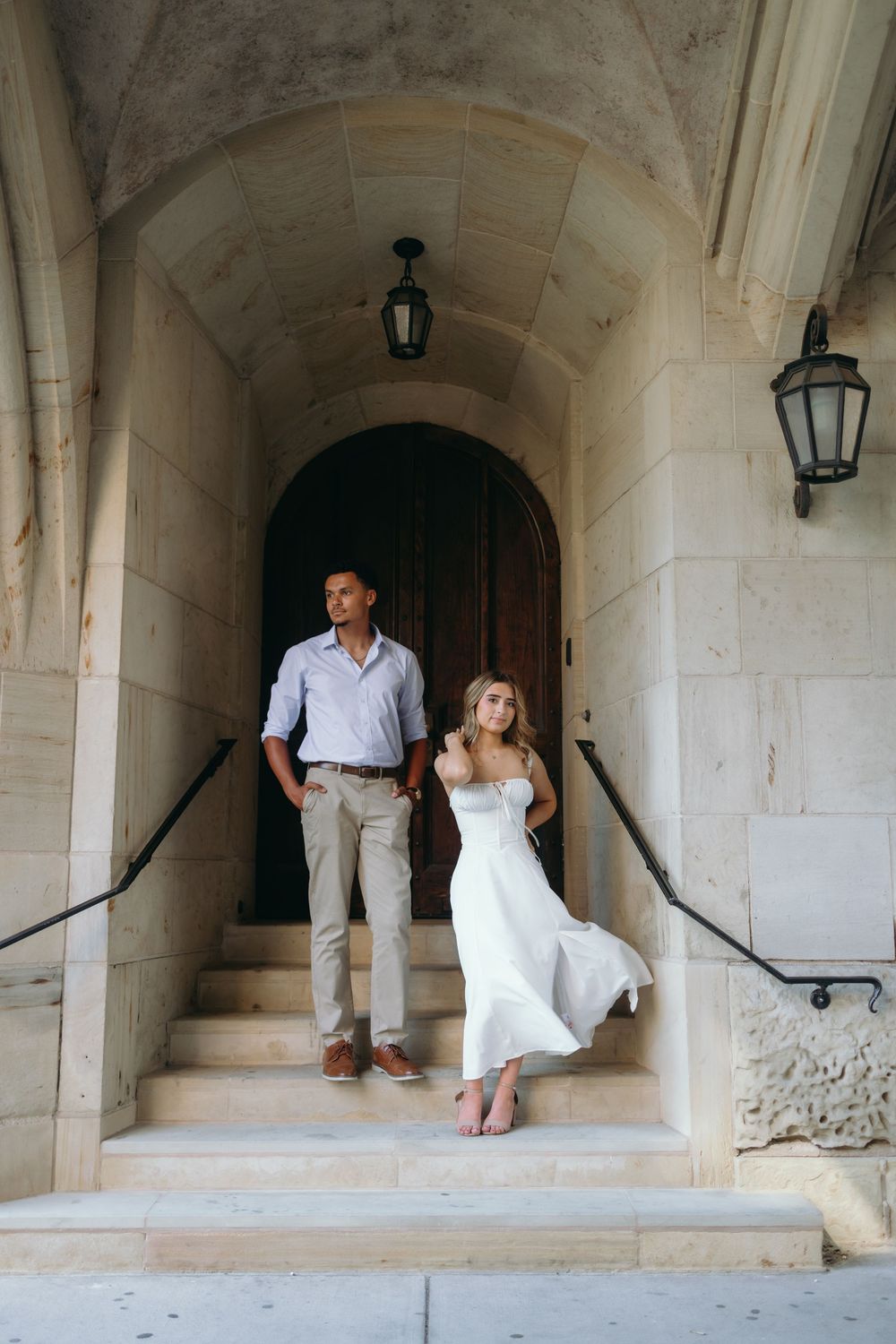 A series of romantic poses in a stone archway featuring a couple in wedding attire.