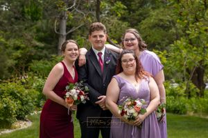 groom with bridesmaids