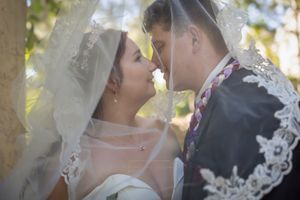 veil image with couple looking at each other