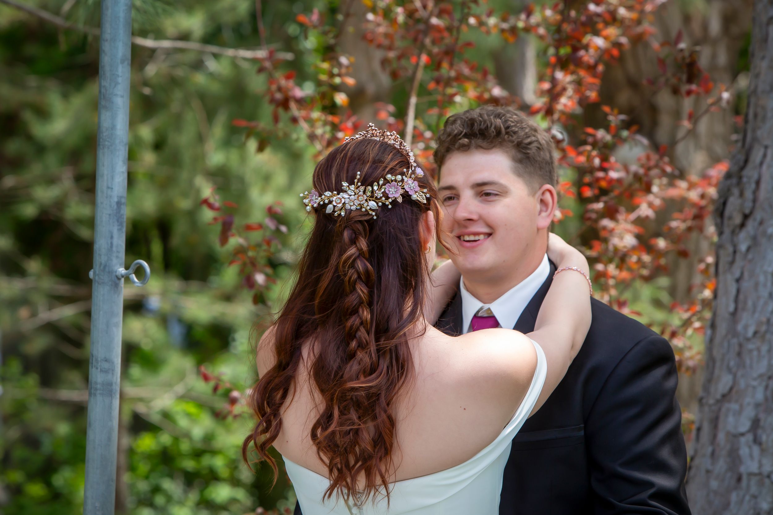 Wedding @ Wild Rose Manor groom smiling at bride with arms around his neck