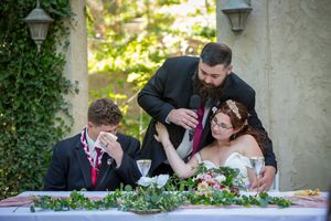 emotional speech with groom wiping tears