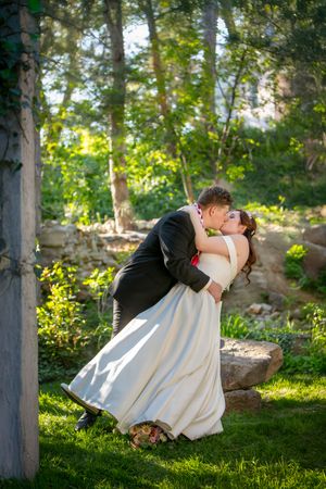 groom dipping bride
