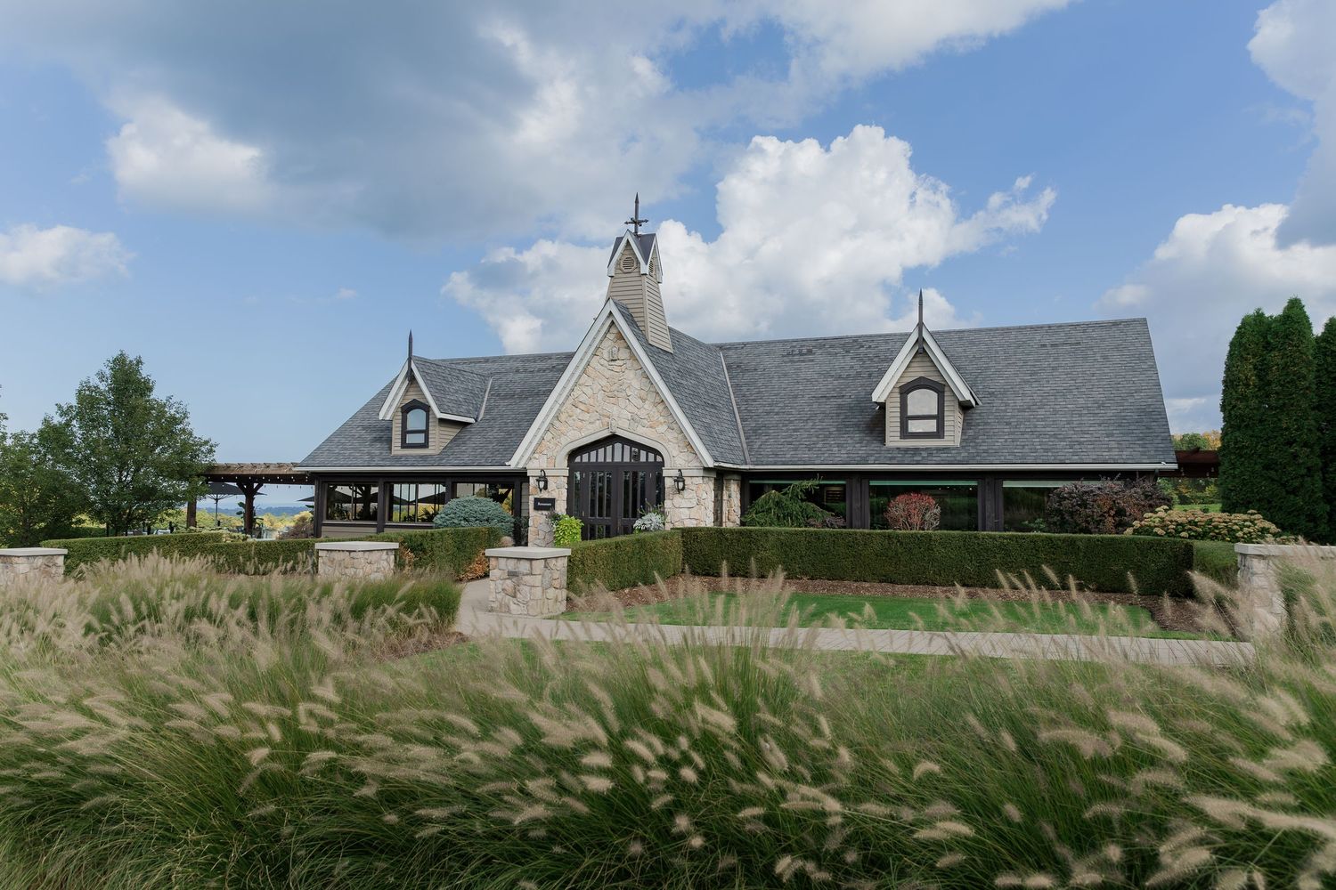 Gothic-inspired winery building with stone facade and ornate architectural details at Vineland Estates Winery.