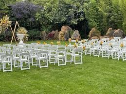 luxury garden wedding venue in Nairobi, captured by Nairobi Wedding Photographer, Bonnie Gichuru, showcasing lush greenery and flower arches