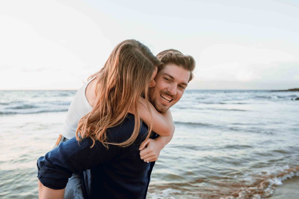 Proposal engagement couple photo shoot during sunset beach on Maui Hawaii by ohwowfotos