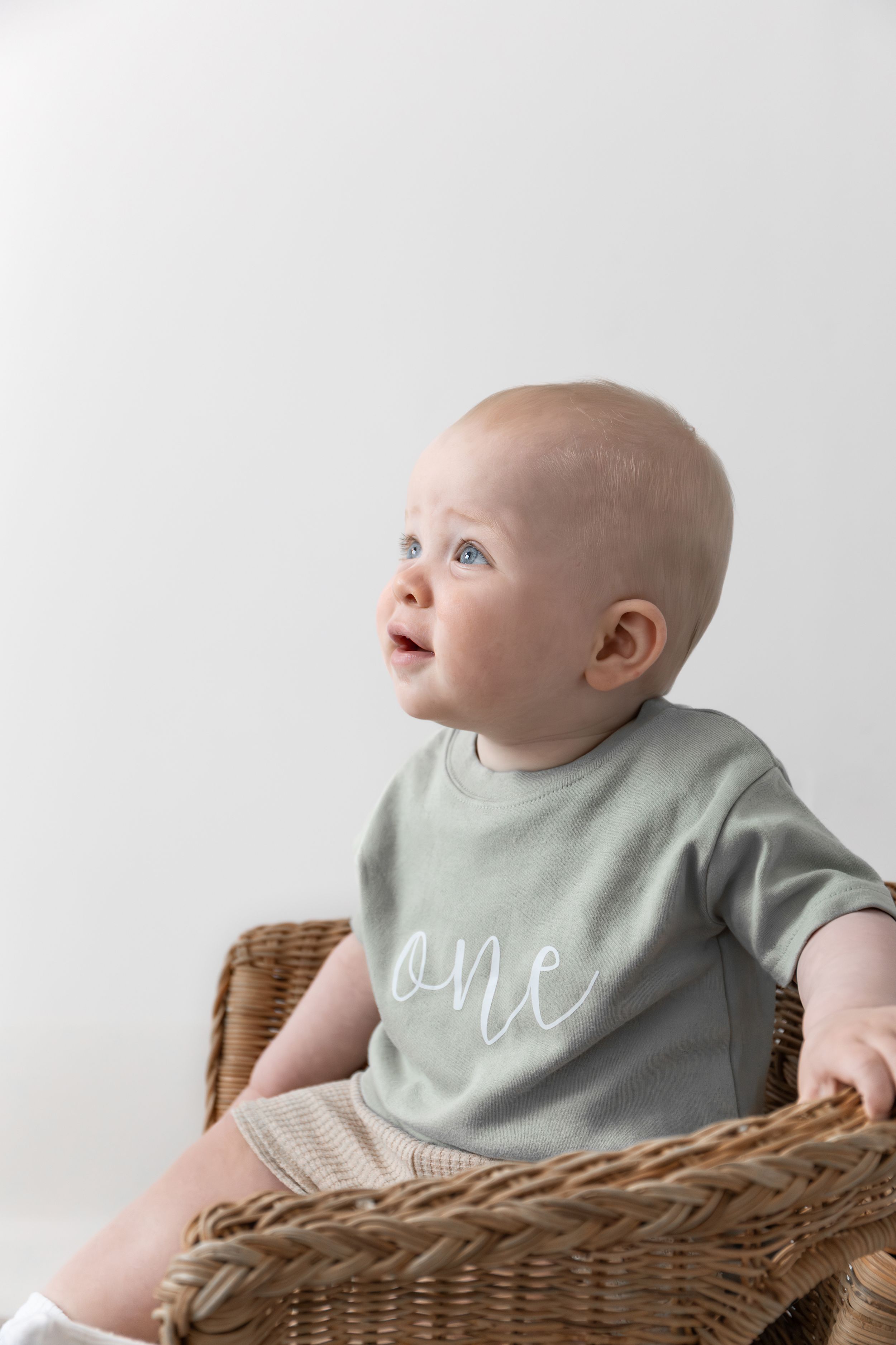 neutral birthday photography Nottingham baby with soft white backdrop studio