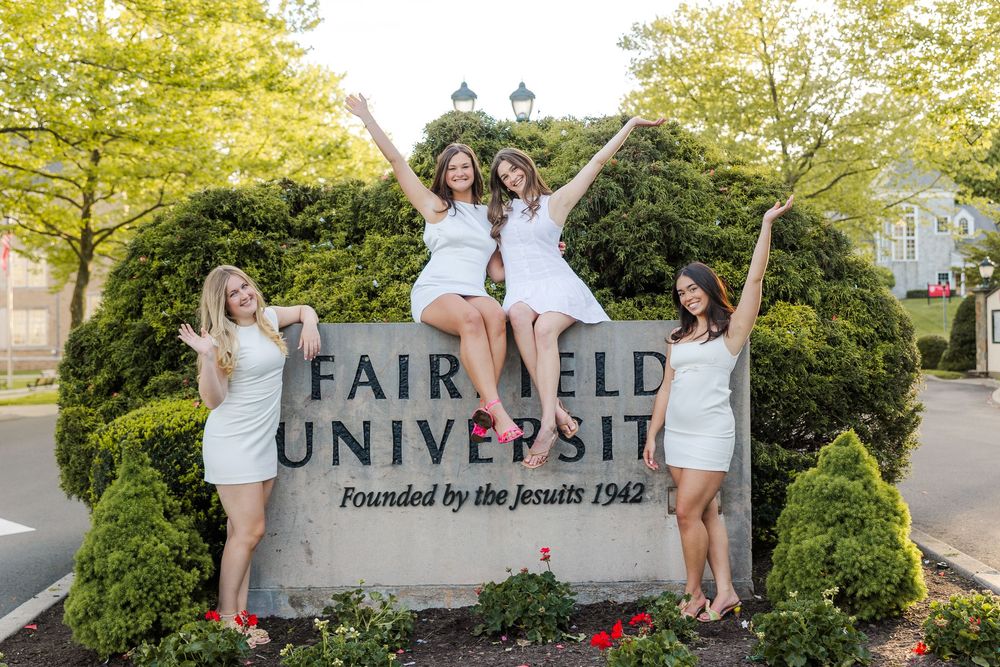 Fairfield University Graduation Photos Bellarmine Hall Stag Statue Fairfield Sign SeaGrape Senior Phots FairfieldGrads Group Friend Photos