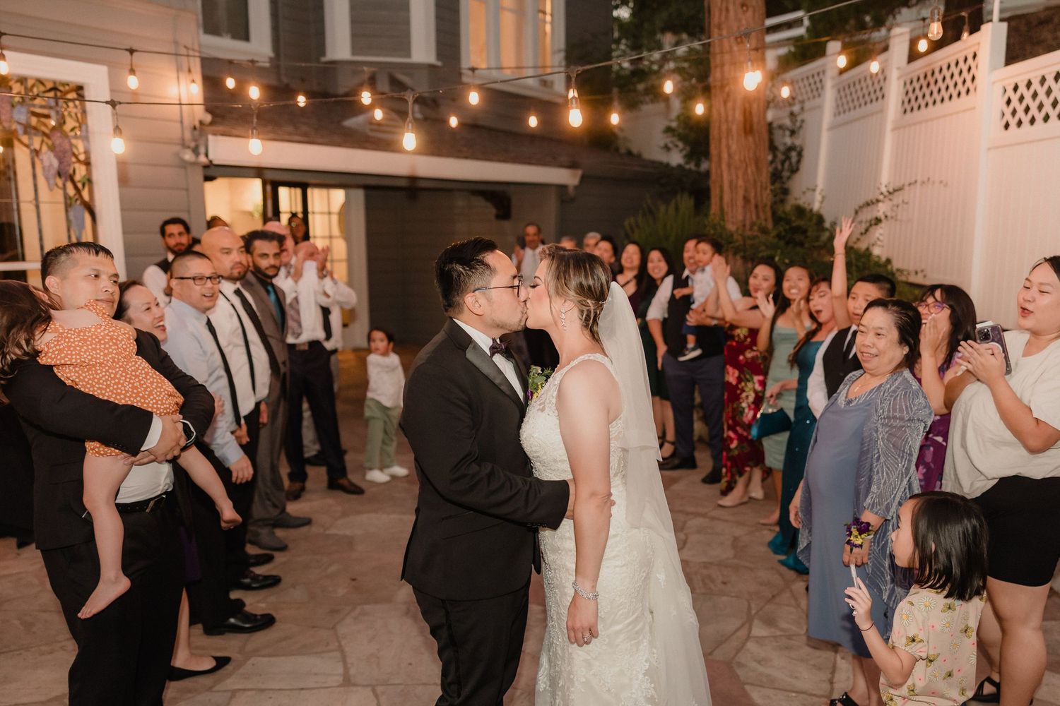 Newly wed couple greeted by guests at the end of the reception from a Sacramento wedding celebration