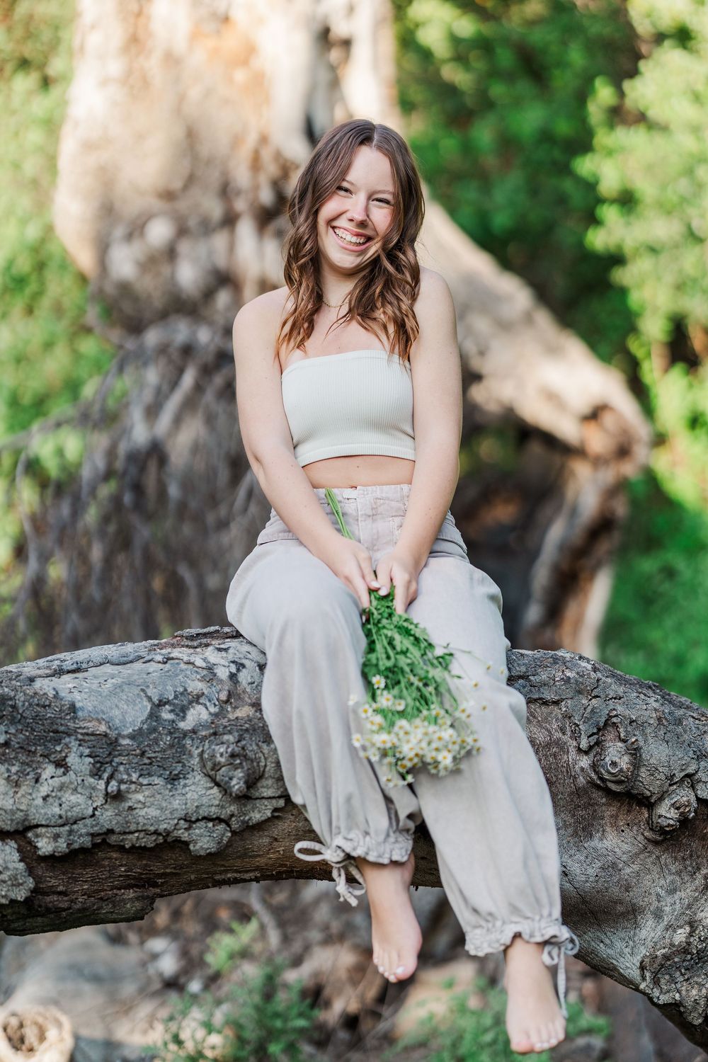 Simi Valley senior at Corriganville Park captured at sunset with yoga poses for unique, personalized senior photos.